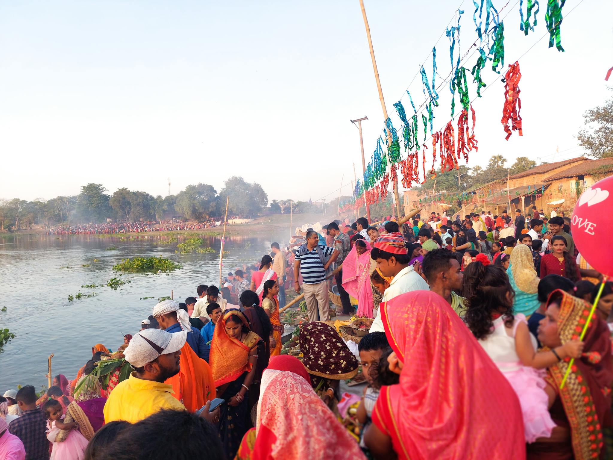 People around Lake in Ritual Celebration